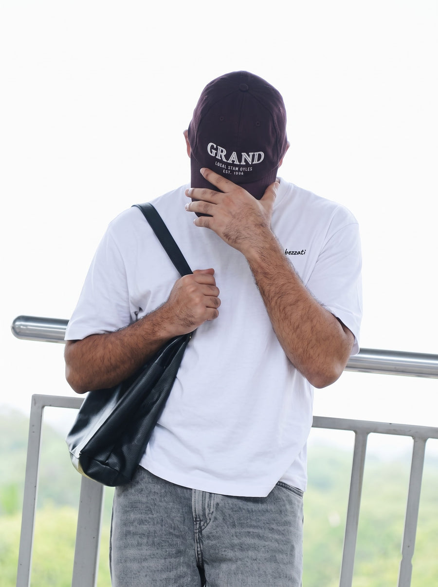 Front of the white Mildly Unstable t-shirt, with a small bezzati script on the left chest