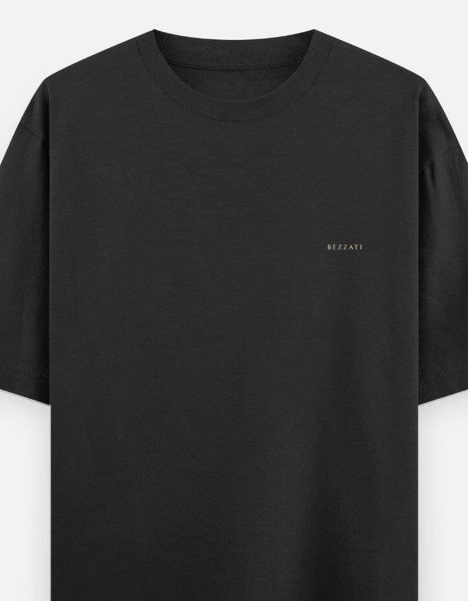 Front of the black Aap Zara oversized t-shirt, plain with a small BEZZATI wordmark on the left chest