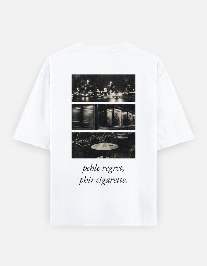 Pehle regret phir cigarette oversized t-shirt in white, back print with the night-photo triptych and the line in italic serif