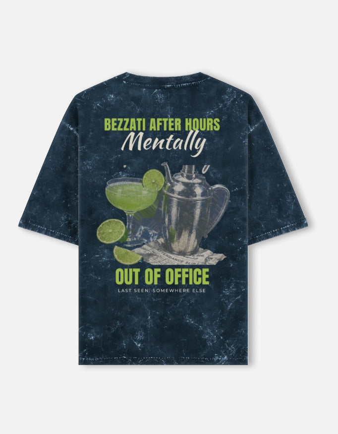 Out Of Office back print on a navy acid-wash oversized t-shirt, with a margarita glass and a cocktail shaker