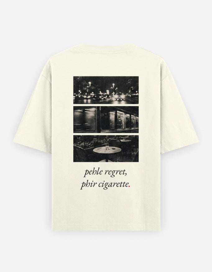 Pehle regret phir cigarette oversized t-shirt in off white, back print with the night-photo triptych and the line in italic serif