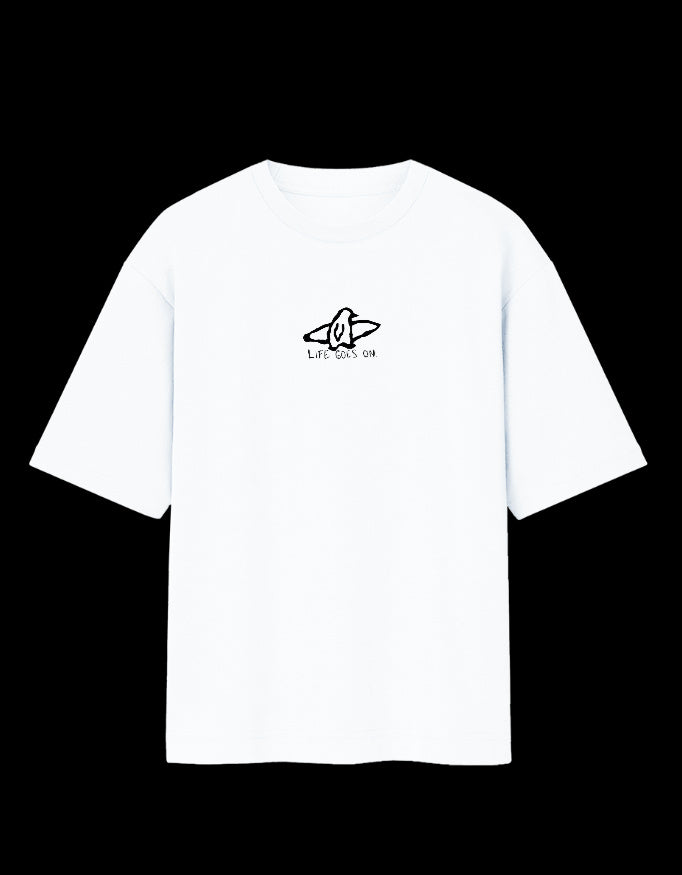 Front of the white Life Goes On oversized t-shirt: a small black ink sketch of a bird with its wings spread wide above the hand-lettered words LIFE GOES ON., centre chest