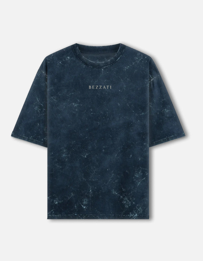 Front of the navy acid-wash oversized t-shirt, plain with a small Bezzati wordmark on the chest