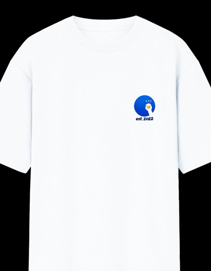 Front of the white Blue Goose oversized t-shirt: a small round blue badge on the left chest with a white goose, an orange beak and three question marks above its head