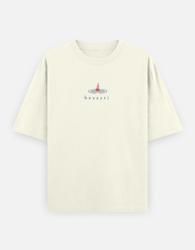 Front of the off-white Tide Archive oversized t-shirt, with a small lighthouse above the bezzati wordmark